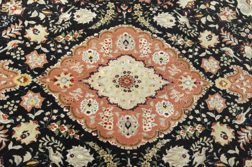 Central medallion detail of 2000s Tabriz 50/60/70 Raj rug from Iran / Persia