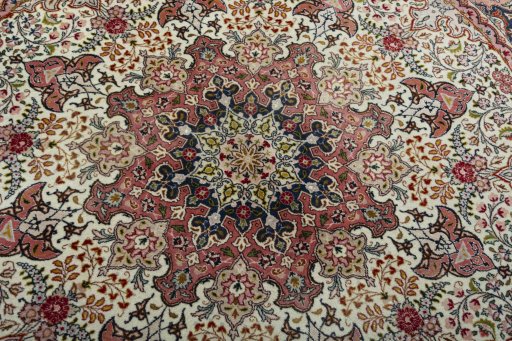 Central medallion detail of New Tabriz 50/60/70 Raj rug from Iran / Persia