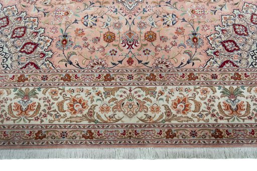 Corner detail of 2000s Tabriz 50/60/70 Raj rug showing border pattern and Cork pile