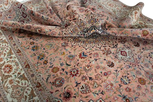 Backside of handmade 2000s Tabriz 50/60/70 Raj rug showing knot structure and weave density
