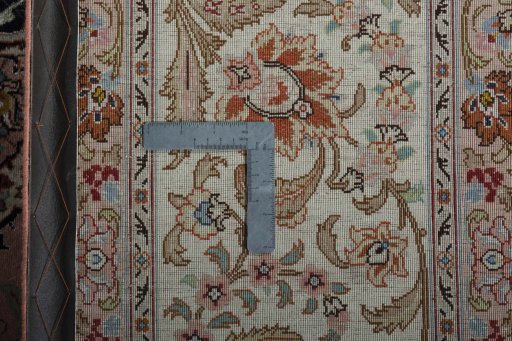 Central medallion detail of 2000s Tabriz 50/60/70 Raj rug from Iran / Persia