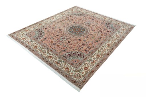 Corner detail of 2000s Tabriz 50/60/70 Raj rug showing border pattern and Cork pile