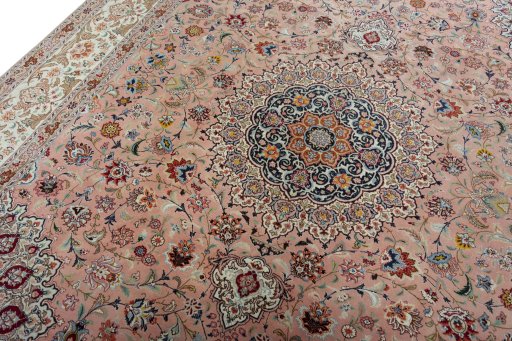 Backside of handmade 2000s Tabriz 50/60/70 Raj rug showing knot structure and weave density