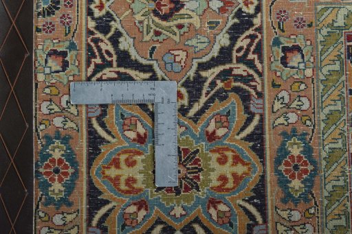 Backside of handmade New Tabriz 50/60/70 Raj rug showing knot structure and weave density