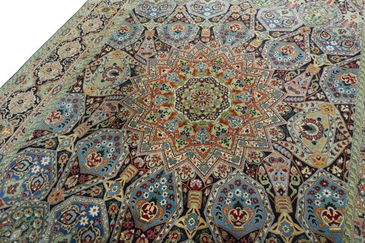 Backside of handmade New Tabriz 50/60/70 Raj rug showing knot structure and weave density
