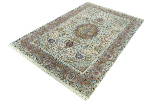 Corner detail of 2000s Tabriz 50/60/70 Raj rug showing border pattern and Cork pile