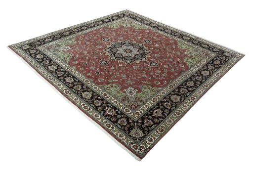 Corner detail of 2000s Tabriz 50/60/70 Raj rug showing border pattern and Cork pile