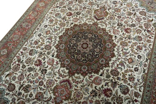 Backside of handmade 2000s Tabriz 50/60/70 Raj rug showing knot structure and weave density