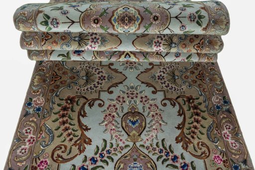 Corner detail of 2000s Tabriz 50/60/70 Raj rug showing border pattern and Cork pile
