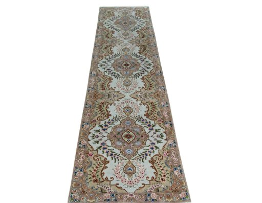 Surface texture of 2000s Tabriz 50/60/70 Raj rug with natural Cork and intricate pattern