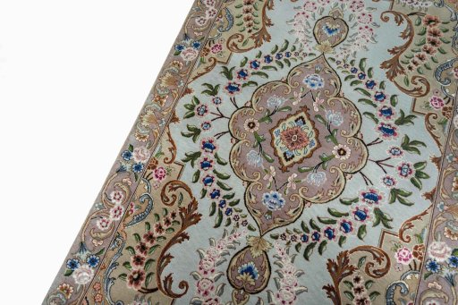 Backside of handmade 2000s Tabriz 50/60/70 Raj rug showing knot structure and weave density