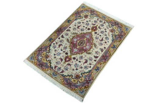 Corner detail of 2000s Tabriz 50/60/70 Raj rug showing border pattern and Cork pile