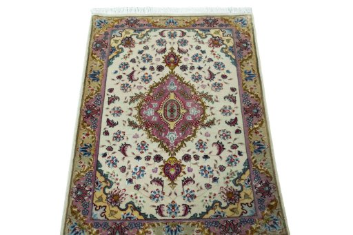 Surface texture of 2000s Tabriz 50/60/70 Raj rug with natural Cork and intricate pattern