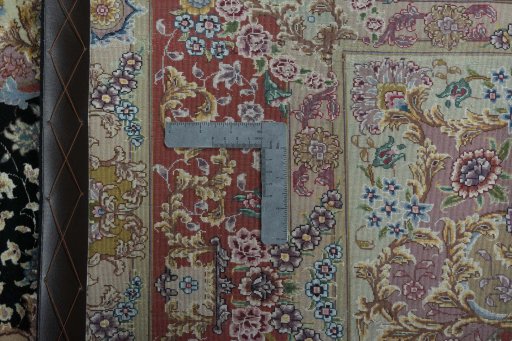 Backside of handmade 2000s Tabriz 50/60/70 Raj rug showing knot structure and weave density