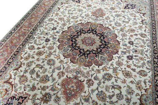 Backside of handmade New Tabriz 50/60/70 Raj rug showing knot structure and weave density