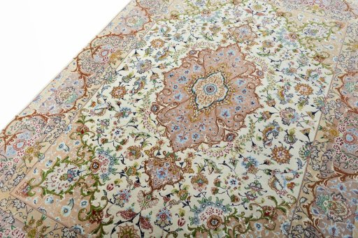 Backside of handmade New Tabriz 50/60/70 Raj rug showing knot structure and weave density