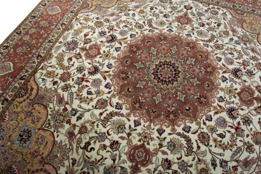 Backside of handmade New Tabriz 50/60/70 Raj rug showing knot structure and weave density