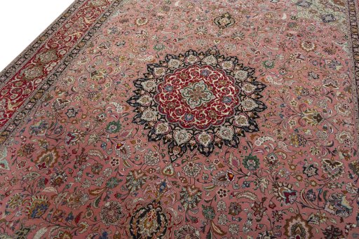 Backside of handmade New Tabriz 50/60/70 Raj rug showing knot structure and weave density