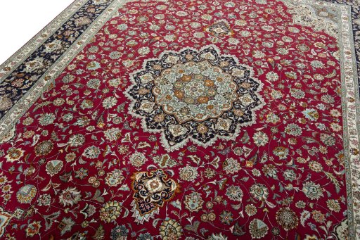 Backside of handmade New Tabriz 50/60/70 Raj rug showing knot structure and weave density