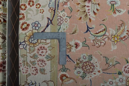 Backside of handmade New Tabriz 50/60/70 Raj rug showing knot structure and weave density