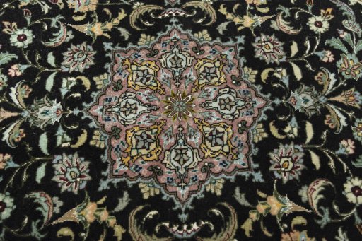 Backside of handmade New Tabriz 50/60/70 Raj rug showing knot structure and weave density