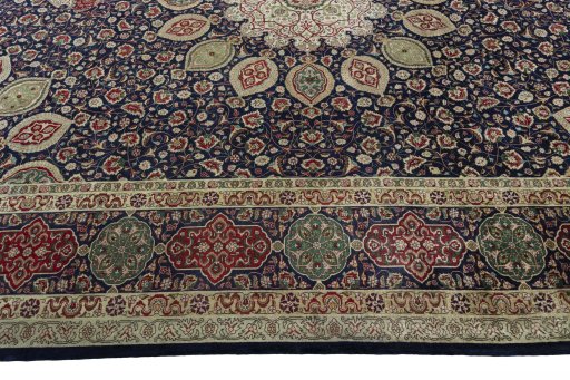 Corner detail of 1950s Tabriz 50/60/70 Raj rug showing border pattern and Cork pile