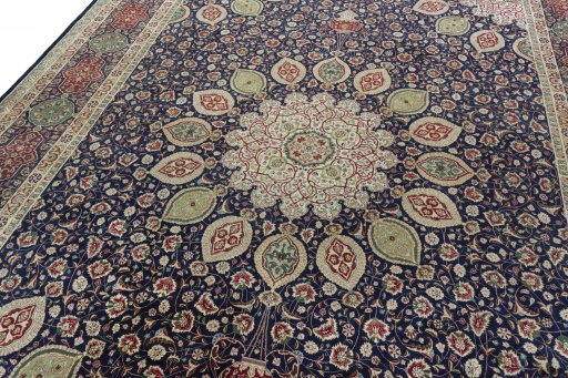 Backside of handmade 1950s Tabriz 50/60/70 Raj rug showing knot structure and weave density