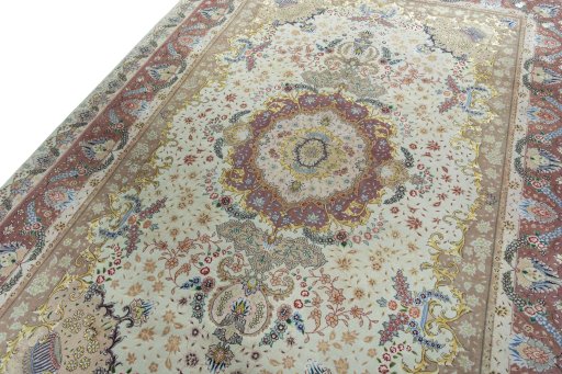 Backside of handmade 2000s Tabriz 50/60/70 Raj rug showing knot structure and weave density