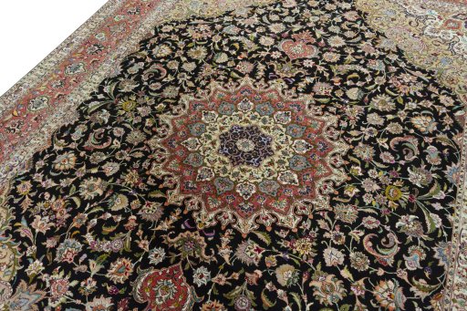 Backside of handmade New Tabriz 50/60/70 Raj rug showing knot structure and weave density
