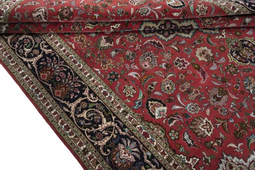 Close-up detail of 2000s Tabriz 50/60/70 Raj rug from Iran / Persia showing Cork weave