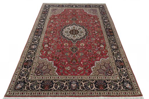 Surface texture of 2000s Tabriz 50/60/70 Raj rug with natural Cork and intricate pattern