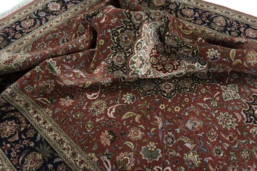 Surface texture of 2000s Tabriz 50/60/70 Raj rug with natural Cork and intricate pattern
