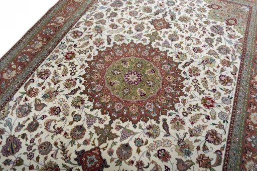 Backside of handmade 2000s Tabriz 50/60/70 Raj rug showing knot structure and weave density