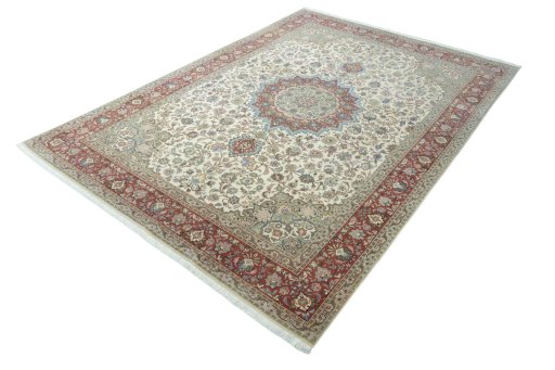 Corner detail of 2000s Tabriz 50/60/70 Raj rug showing border pattern and Cork pile