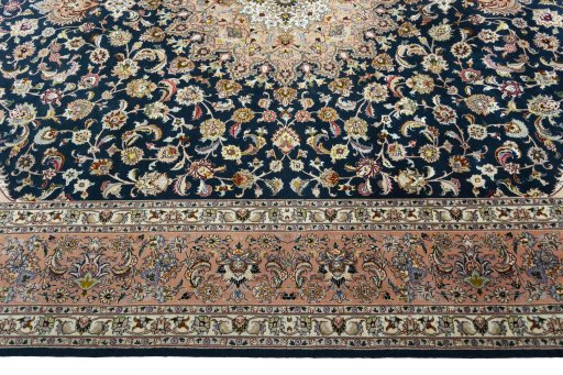 Corner detail of New Tabriz 50/60/70 Raj rug showing border pattern and Cork pile