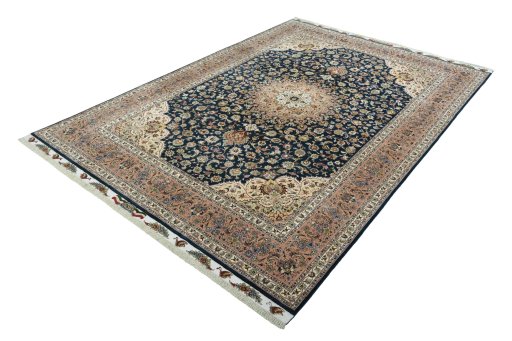 Corner detail of New Tabriz 50/60/70 Raj rug showing border pattern and Cork pile