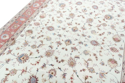 Backside of handmade New Tabriz 50/60/70 Raj rug showing knot structure and weave density