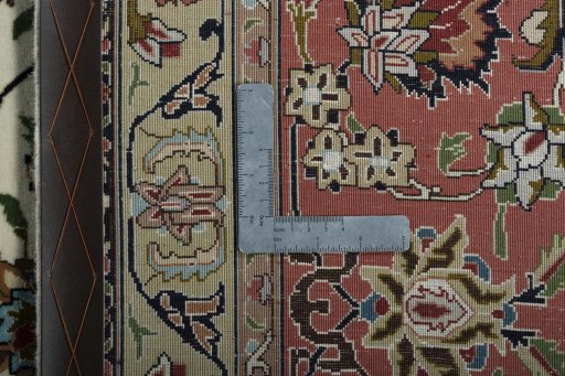 Backside of handmade New Tabriz 50/60/70 Raj rug showing knot structure and weave density