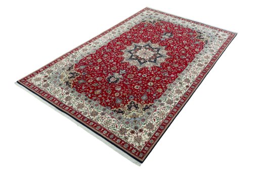 Corner detail of New Tabriz 50/60/70 Raj rug showing border pattern and Cork pile