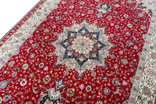 Backside of handmade New Tabriz 50/60/70 Raj rug showing knot structure and weave density
