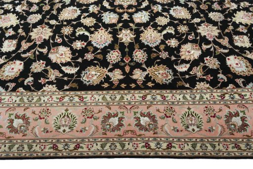 Corner detail of New Tabriz 50/60/70 Raj rug showing border pattern and Cork pile