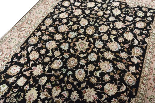 Backside of handmade New Tabriz 50/60/70 Raj rug showing knot structure and weave density