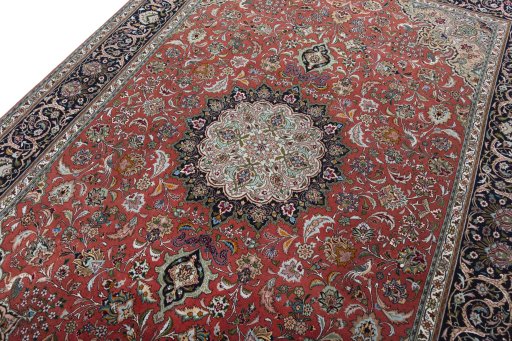 Backside of handmade New Tabriz 50/60/70 Raj rug showing knot structure and weave density