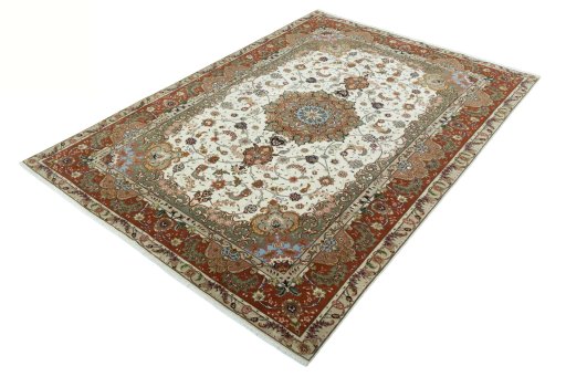 Corner detail of New Tabriz 50/60/70 Raj rug showing border pattern and Cork pile