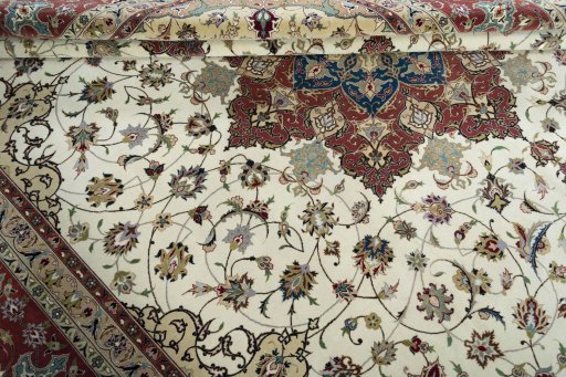 Close-up detail of 2000s Tabriz 50/60/70 Raj rug from Iran / Persia showing Cork weave