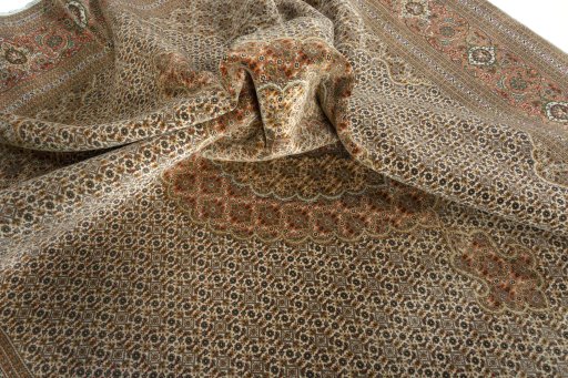 Surface texture of 2000s Tabriz 50/60/70 Raj rug with natural Cork and intricate pattern