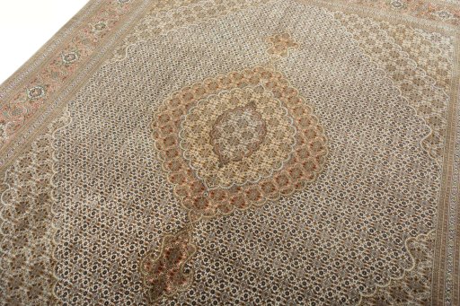 Backside of handmade 2000s Tabriz 50/60/70 Raj rug showing knot structure and weave density