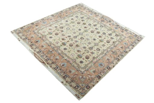 Corner detail of 2000s Tabriz 50/60/70 Raj rug showing border pattern and Cork pile