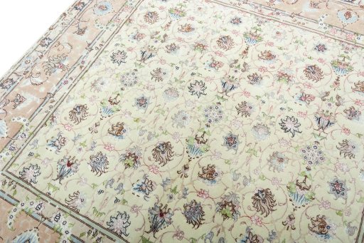 Backside of handmade 2000s Tabriz 50/60/70 Raj rug showing knot structure and weave density