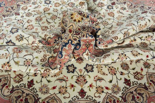 Corner detail of 2000s Tabriz 50/60/70 Raj rug showing border pattern and Cork pile